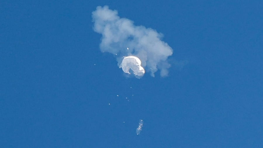 The suspected Chinese spy balloon drifts to the ocean after being shot down off the coast in Surfside Beach. Credit: Reuters File Photo
