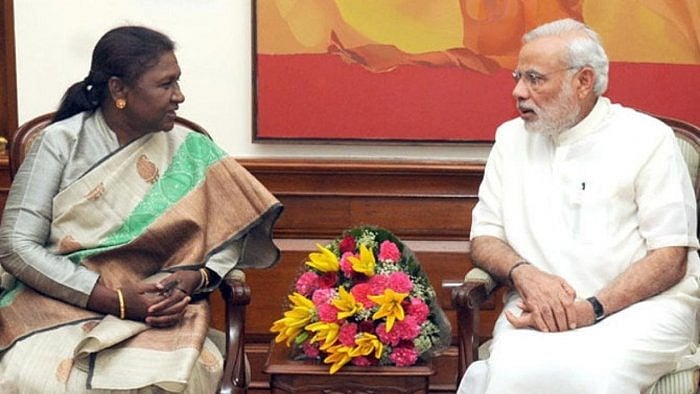 Droupadi Murmu with PM Narendra Modi. Credit: IANS Photo