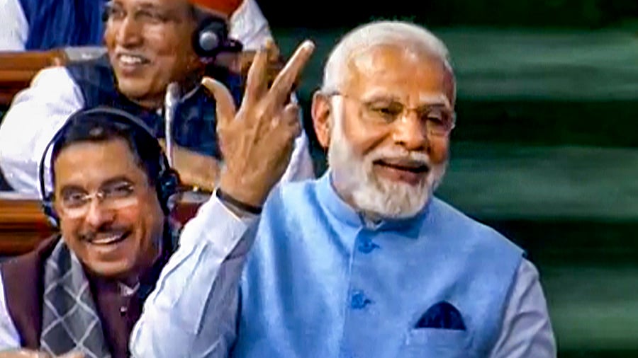 Prime Minister Narendra Modi replies to the Motion of Thanks on the President's address in the Lok Sabha. Credit: PTI Photo