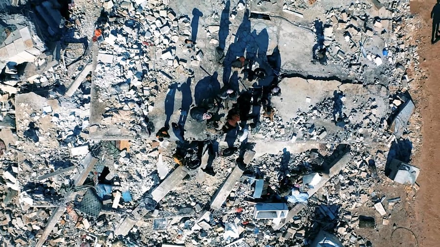 Damaged buildings and rescue operations are seen in the aftermath of the earthquake, in Aleppo, Syria February 7, 2023, in this screen grab taken from a social media video. Credit: Reuters Photo