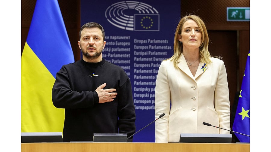 European Parliament President Roberta Metsola stands next to Ukrainian President Volodymyr Zelenskiy at the European Parliament, during Zelenskiy's second international trip since Russia's invasion of Ukraine. Credit: Reuters Photo