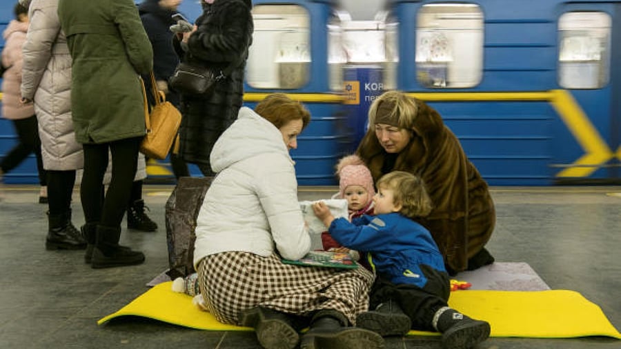 People take shelter inside a metro station during massive Russian missile attacks in Kyiv, Ukraine, February 10, 2023. Credit: Reuters Photo