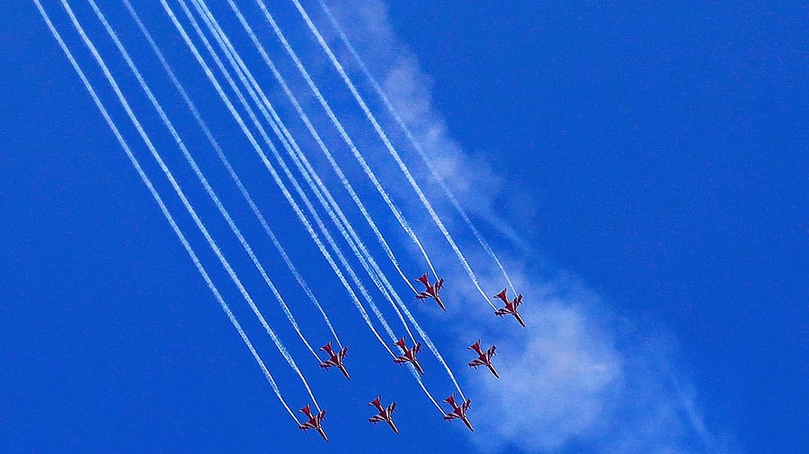 Indian Air Force's aerobatics team Surya Kiran performs during rehearsals for the upcoming Aero India-2023 air show, at Yelahanka airbase in Bengaluru. Credit: PTI Photo