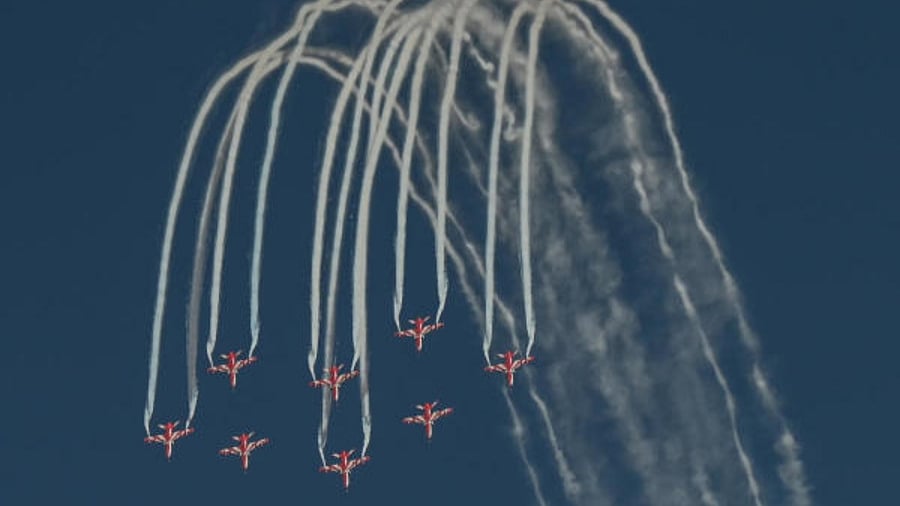 Indian Air Force (IAF) Suryakiran aerobatic team performs during the Aero India 2023 air show. Credit: DH Photo/S K Dinesh