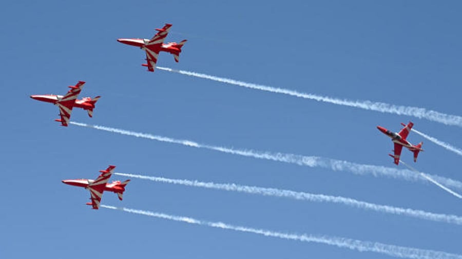 Suryakiran aerobatic team of the Indian Air Force performs during the second day of Aero India 2023 at Yelahanka Air base in Bengaluru on Tuesday. Credit: DH Photo/Pushkar V