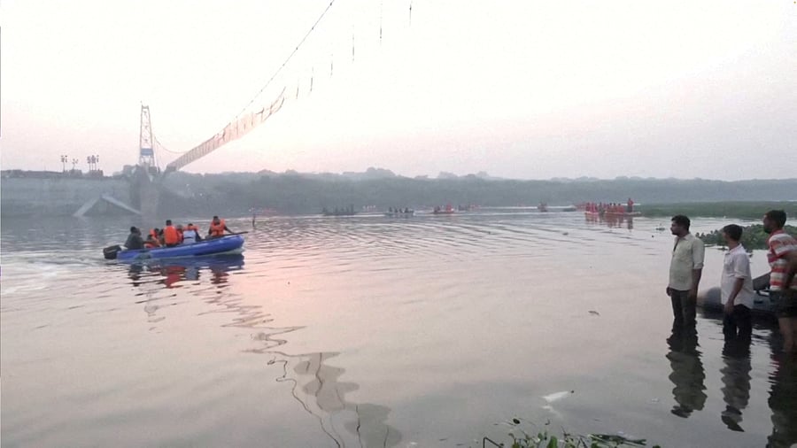 The ill-fated bridge, which collapsed on October 30 last year, was maintained and operated by Oreva Group under an agreement signed with the Morbi municipality. Credit: Reuters Photo