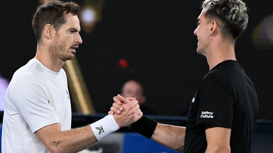 Andy Murray and Thanasi Kokkinakis at the Australian Open. Credit: AFP Photo