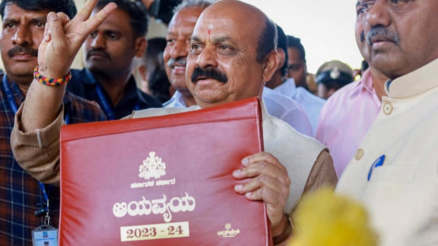 Karnataka Chief Minister Basavaraj Bommai arrives to present the State Budget for the financial year 2023-24, at Vidhana Soudha, in Bengaluru. Credit: PTI Photo