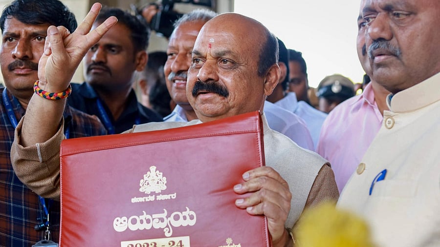 Karnataka Chief Minister Basavaraj Bommai arrives to present the State Budget for the financial year 2023-24, at Vidhana Soudha, in Bengaluru. Credit: PTI Photo