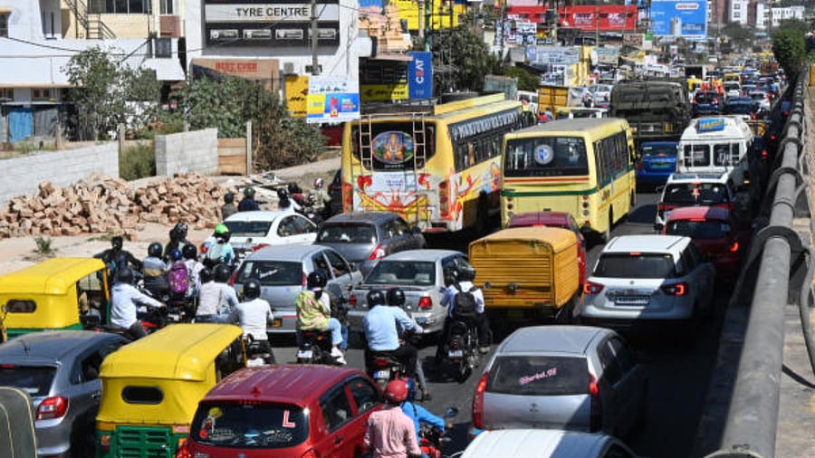Roads leading to the Yelahanka Air Force station were completely jammed on Thursday. Credit: DH Photo/B K Janardhan