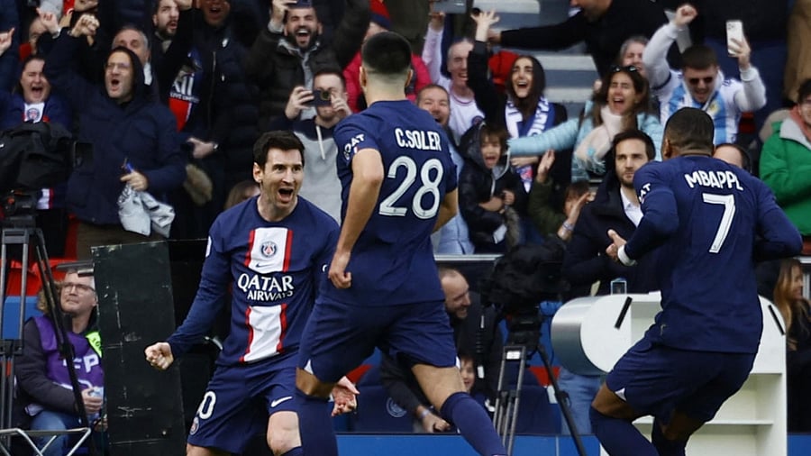 Lionel Messi celebrates scoring their fourth goal with Carlos Soler and Kylian Mbappe. Credit: Reuters Photo