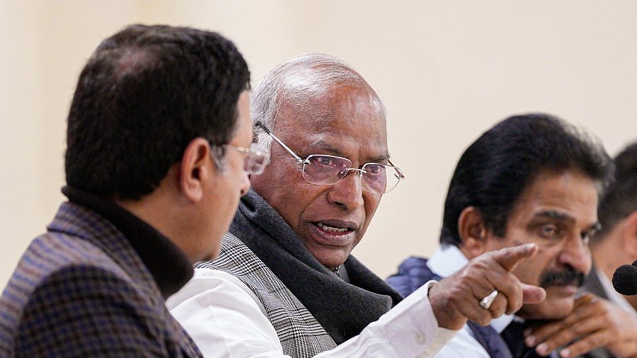 Congress President Mallikarjun Kharge with senior party leaders K.C. Venugopal and Randeep Singh Surjewala. Credit: PTI Photo