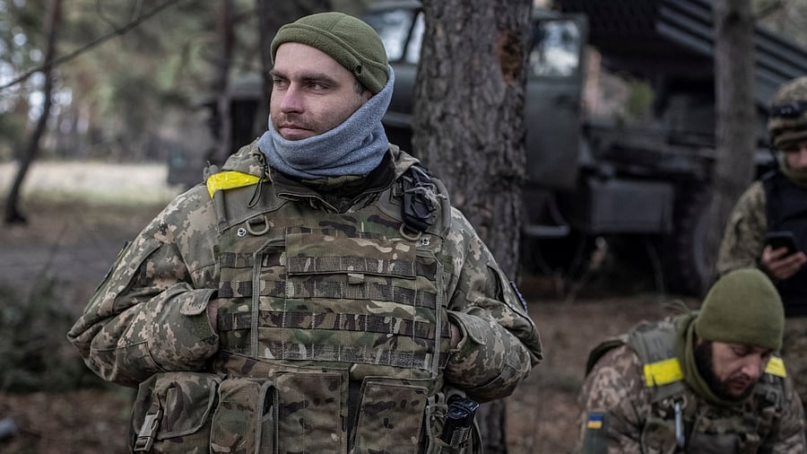 Ukrainian service members near their position at a frontline in Donetsk region. Credit: Reuters Photo