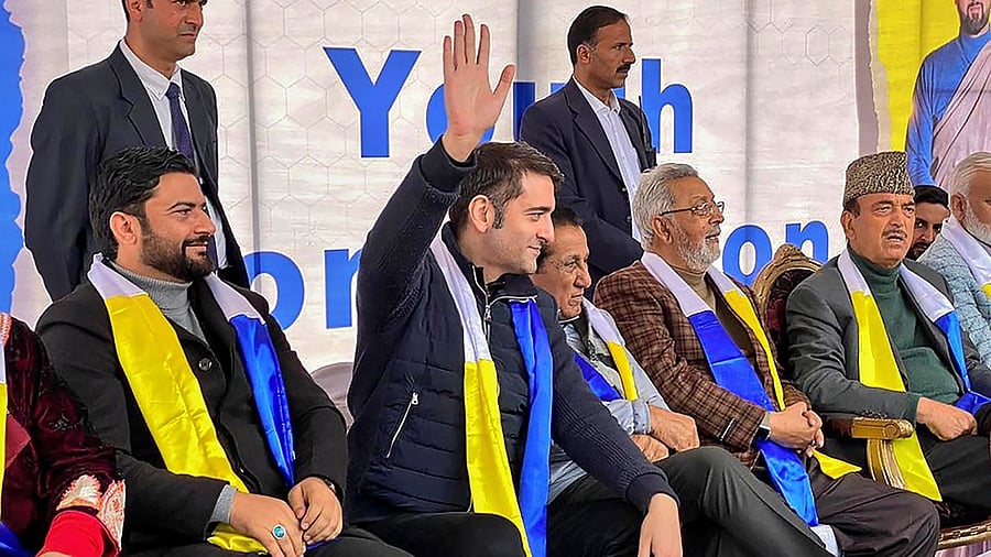 Democratic Progressive Azad Party (DPAP) chief Ghulam Nabi Azad with his son Saddam Nabi Azad and others at the party's youth convention in Srinagar, Sunday, Feb. 26, 2023. Credit: PTI Photo