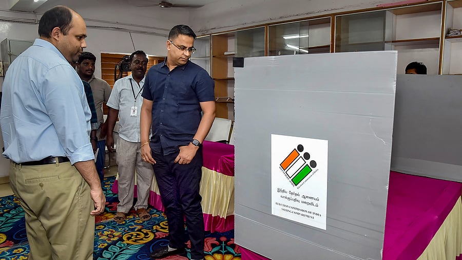 Officials inspect a polling booth ahead of the Erode (East) Assembly seat bypoll. Credit: PTI Photo