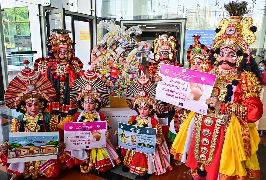 Artistes in Yakshagana attire create awareness about the 'StopTobacco' app during its launch in Bengaluru on Tuesday. Credit: DH Photo