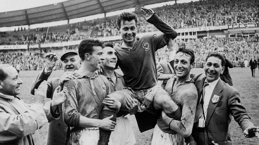 Just Fontaine (C) lifted by teammates after he scored four goals against Germany during a third place match of the 1958 Swedish World Cup, in Goteborg on June 28, 1958. Credit: AFP archive Photo 