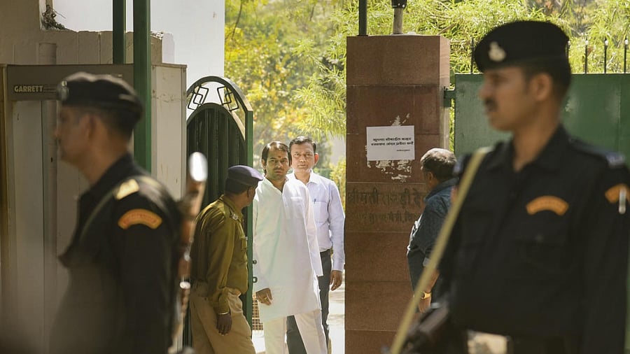 RJD MLA Tej Pratap at the residence of former Bihar CM Rabri Devi during a visit of CBI officials. Credit: PTI Photo