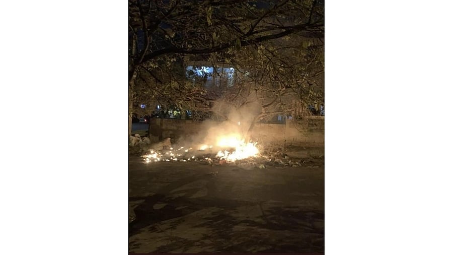 The dumpsite on fire on Tuesday night. The flames raged on for at least 30 to 45 minutes. Credit: Special Arrangement 