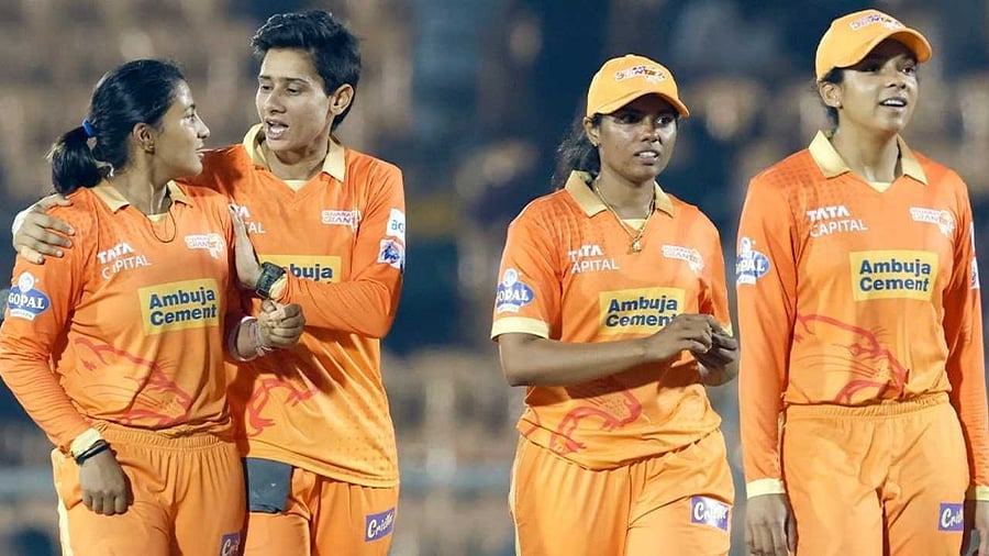 Gujarat skipper Sneh Rana with teammates after win over RCB. Credit: IANS Photo
