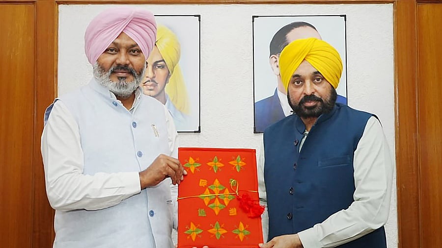 Punjab Chief Minister Bhagwant Mann and Finance Minister Harpal Singh Cheema with Punjab Budget for FY 2023-24. Credit: PTI Photo