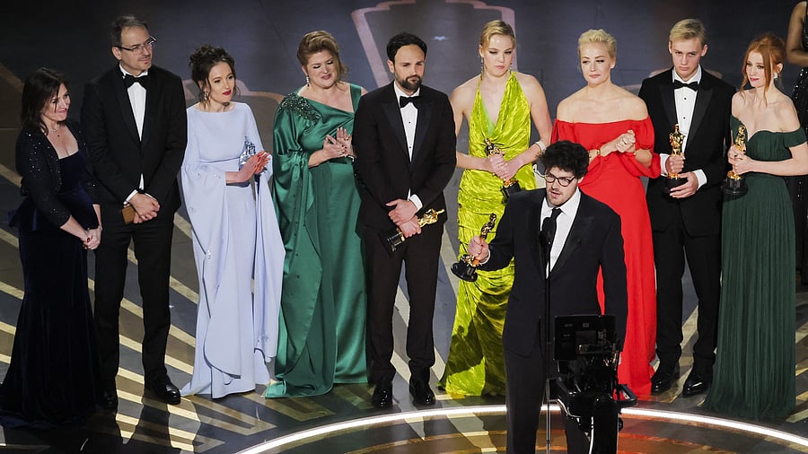 Daniel Roher and the team of "Navalny" win the Oscar for Best Documentary Feature Film. Credit: Reuters Photo
