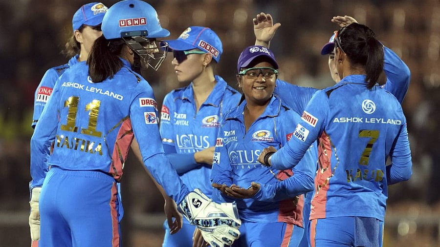 Mumbai Indians bowler Saika Ishaque celebrates the wicket of UP Warriorz player Devika Vaidya during the Women's Premier League. Credit: PTI Photo