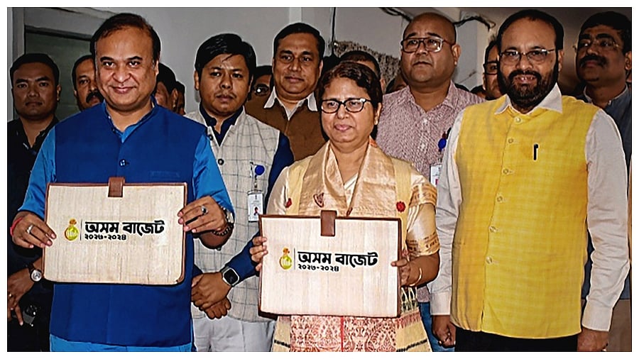 Assam Chief Minister Himanta Biswa Sarma with Assam Finance Minister Ajanta Neog arrives for the presentation of the State Budget for financial year 2023-24. Credit: PTI Photo