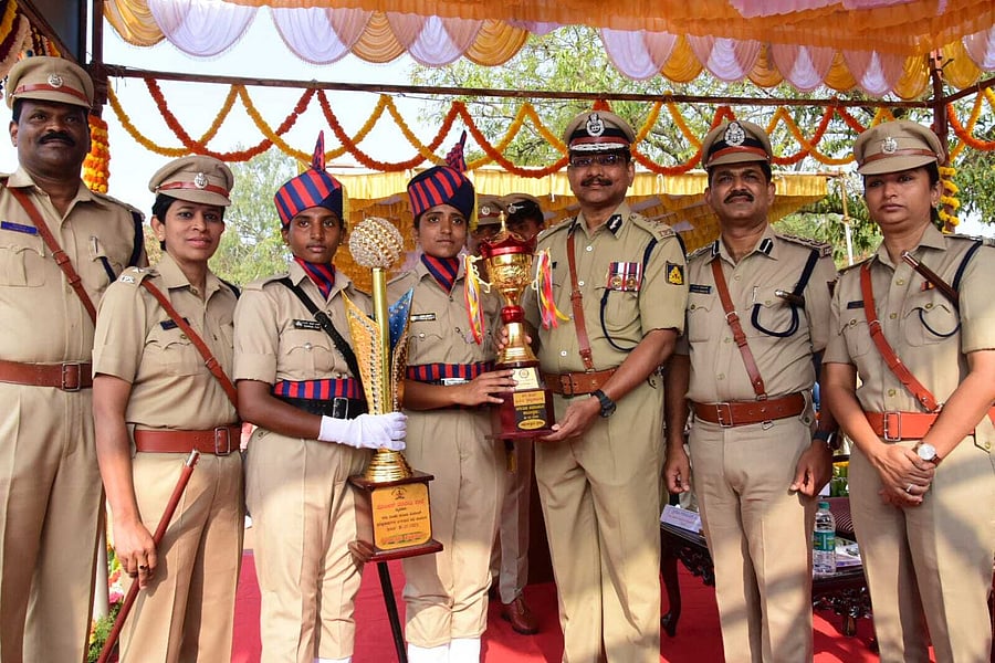 H S Gange and K R Vedika receiving the 'All Round Best Trainee' awards from Director General of Police (Taining), Dr P Ravindranat. Credit: DH Photo