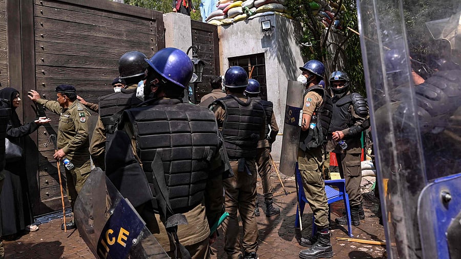 Pakistan police have reached the Lahore residence of the former PM where his wife Busra Bibi is allegedly alone. Credit: AFP Photo