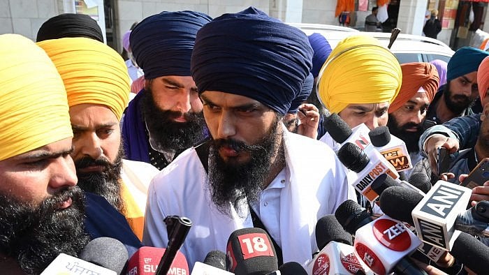 Amritpal Singh (C). Credit: AFP Photo