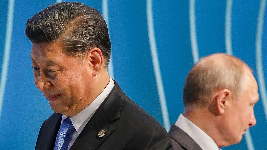 In this file photo taken on November 13, 2019, Russia's President Vladimir Putin (R) and China's President Xi Jinping attend the 11th edition of the BRICS Summit in Brasilia. Credit: AFP Photo