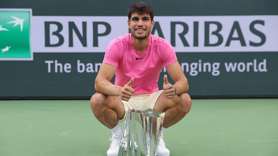 Carlos Alcaraz with the BNP Paribas Open trophy. Credit: AFP Photo