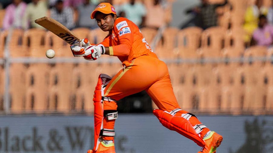 Gujarat Giants player Dayalan Hemalatha plays a shot during the Women's Premier League T20 cricket match between UP Warriorz and Gujarat Giants. Credit: PTI Photo
