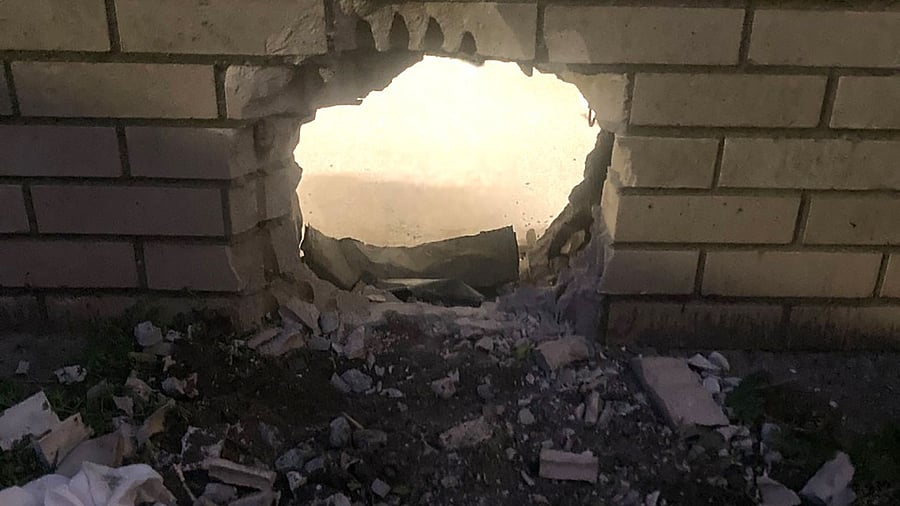 the hole made by inmates John Garza and Arley Nemo to escape from jail. Credit: AFP PHOTO / Newport News Sheriff's Office