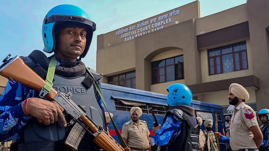 Security personnel deployed at Baba Bakala court, where seven associates of ‘Waris Punjab De’ chief Amritpal Singh were brought, near Amritsar. Credit: PTI Photo