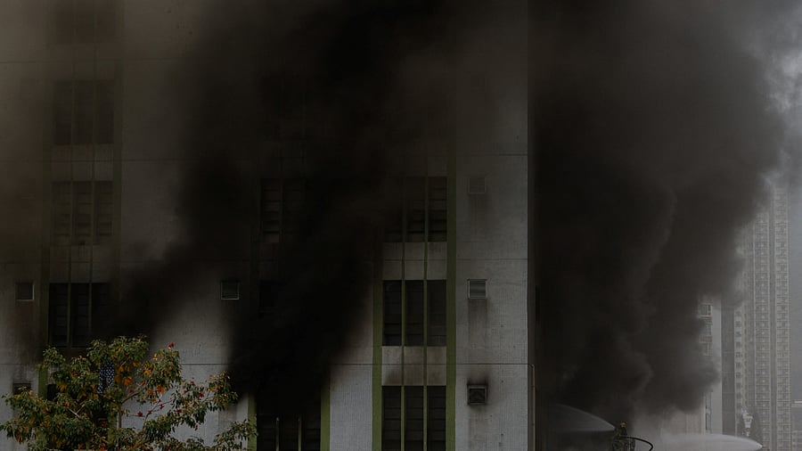 A blaze is seen at a warehouse in the city's bustling Kowloon district, in Hong Kong. Credit: Reuters Photo
