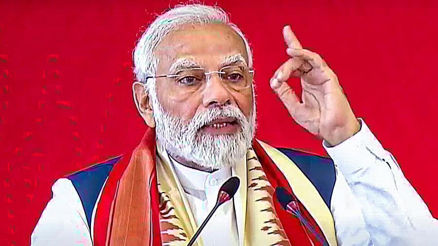 Prime Minister Narendra Modi speaks during the inauguration of Sri Madhusudan Sai Institute of Medical Science & Research, in Chikkaballapur, Saturday. Credit: PTI Photo
