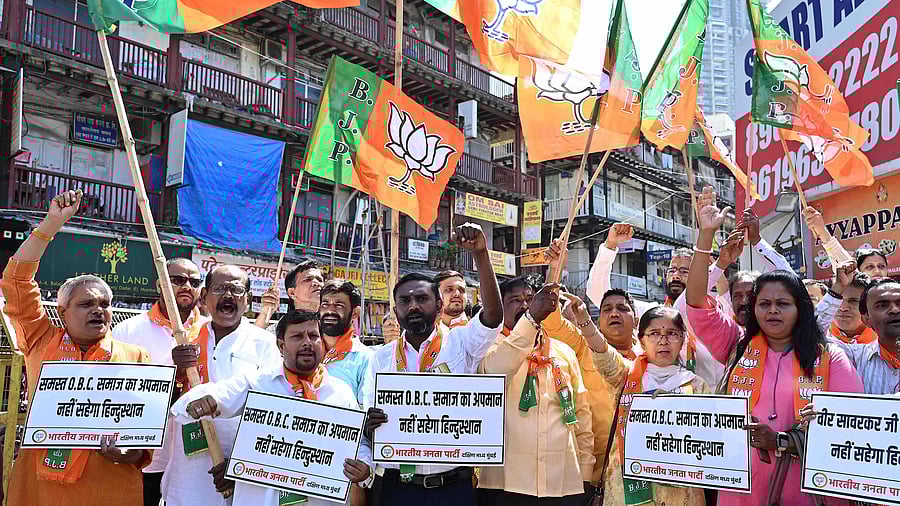 Activists of the Bharatiya Janata Party (BJP) take part in a protest against Congress party leader Rahul Gandhi in Mumbai on March 25, 2023. Credit: AFP Photo