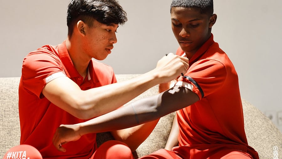 Indonesian players wear black to symbolize grief over the cancellation of their U-20 team competing in the World Cup. Credit: Twitter/PSSI