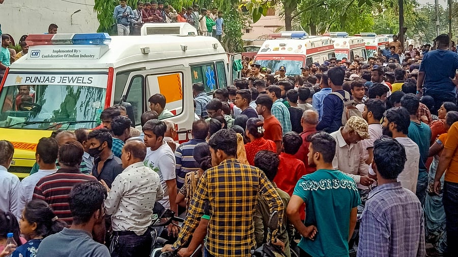 Ambulances arrive at the temple after the roof of an ancient ‘bavdi’ (well) situated in a temple collapsed during Ram Navmi celebrations, in Indore, Thursday, March 30, 2023. At least 25 people are feared to have fallen inside, according to officials. Credit: PTI Photo