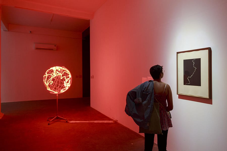 A visitor at the Tangled Hierarchy exhibition