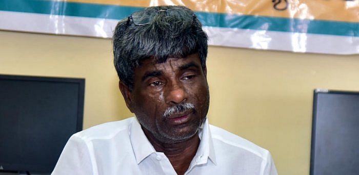 Social Welfare Minister Kota Srinivasa Poojary. Credit: DH Photo