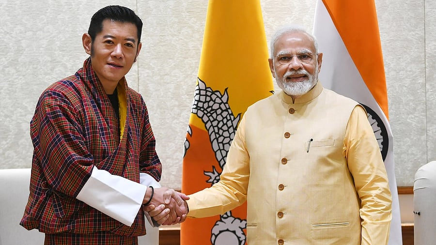 File photo of PM Narendra Modi with King of Bhutan Jigme Khesar Namgyel Wangchuck. Credit: PTI Photo