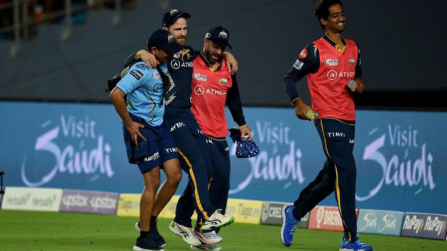 Williamson being carried away after his injury. Credit: AFP Photo