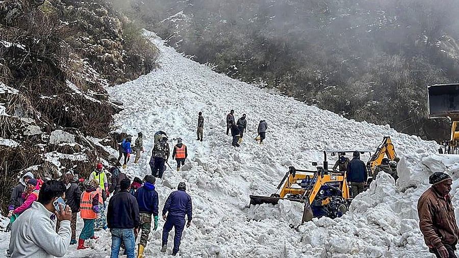 Rescue operations underway on JNM Road in East Sikkim after an avalanche. Credit: PTI Photo