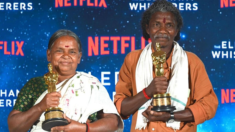 The duo pose with the Oscars