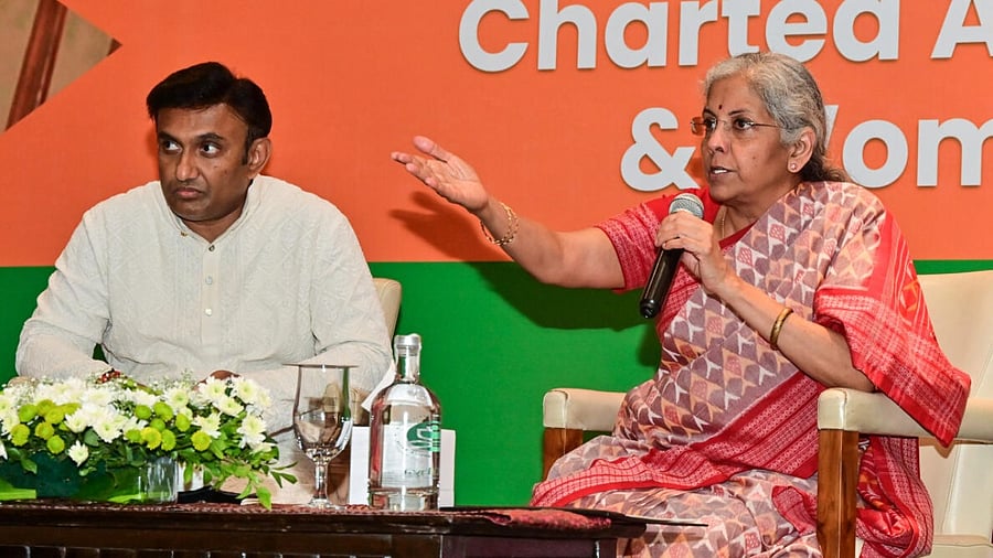 Union Finance Minister Nirmala Sitharaman speaks at a meeting of women entrepreneurs, chartered accountants and other professionals, in Bengaluru on Thursday. credit: DH Photo