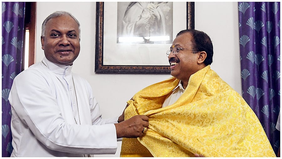 Union Minister of State for External Affairs and Parliamentary Affairs V. Muraleedharan being welcomed by Archbishop of the Roman Catholic Archdiocese of Trivandrum. Credit: PTI Photo
