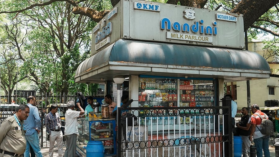<div class="paragraphs"><p>Customers at a Nandini milk shop in Bengaluru, Monday, April 10, 2023. </p></div>